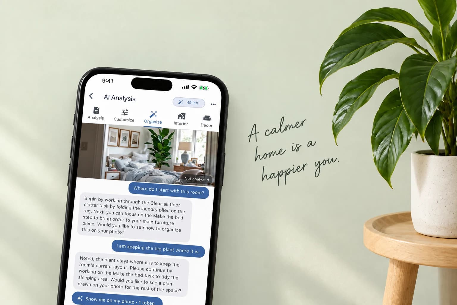 Neat Pilot Organize Coach showing a bedroom photo and practical organizing advice, presented in a phone beside a green plant.